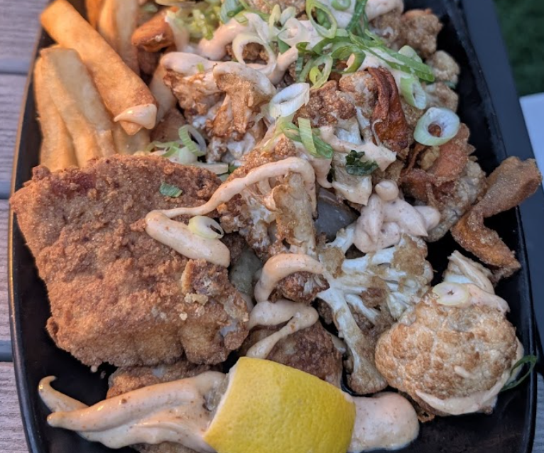 Benny's Coastal Kitchen signature dishes Benny's Platter (fried seafood)Oysters BennyBlackened Scallops